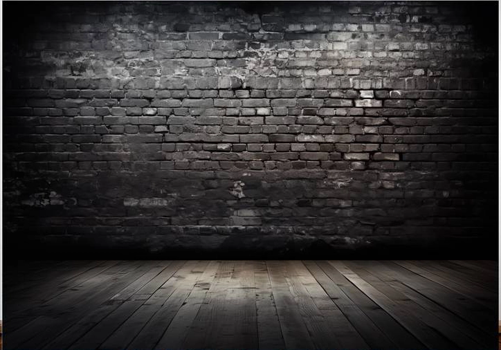 Fond photo représentant  un mur de briques noires et un plancher sombre. C'est une ambiance grenier.
