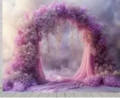 Fond photo représentant un arche remplies de fleurs. Du voilage tombe sur les cotés. 